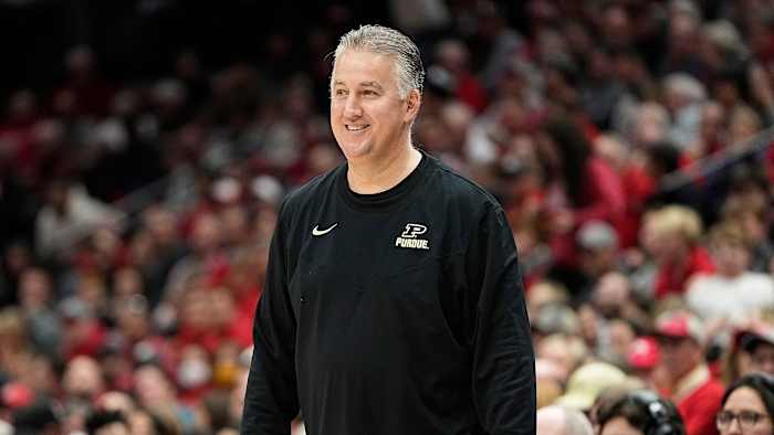 Purdue coach Matt Painter smiles on the sideline.